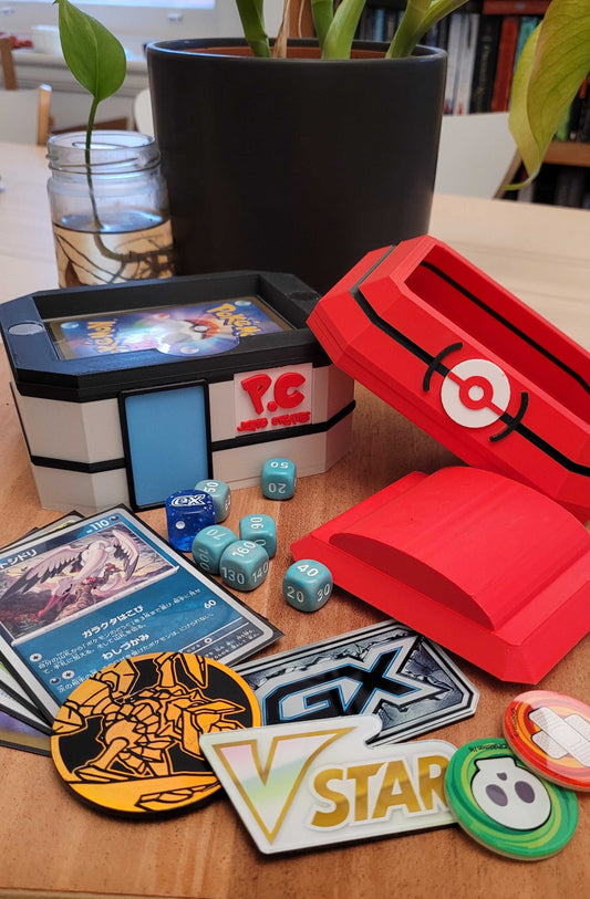 Pokemon Center Deck box with dice storage and Pokemon cards displayed on a table