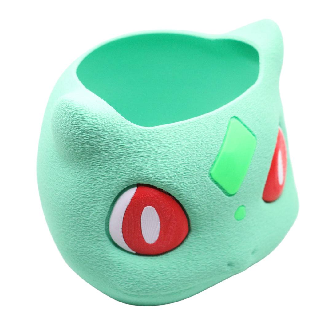 Bulbasaur storage bin desk organizer in green with red eyes and decorative design