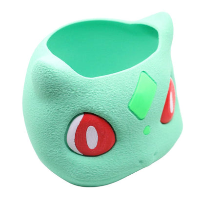 Bulbasaur storage bin desk organizer in green with red eyes and decorative design