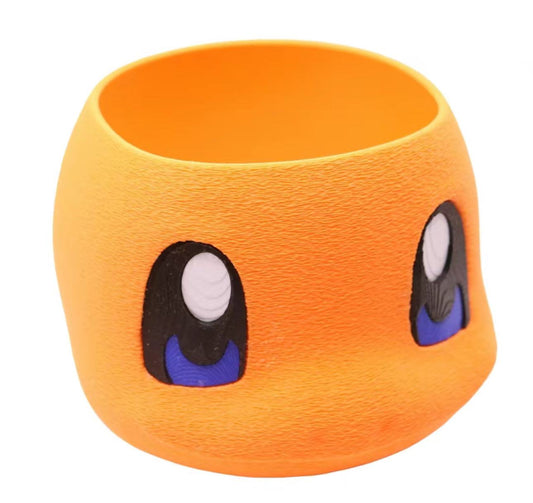 Orange Charmander Storage Bin with large eyes for desk or gaming room decor