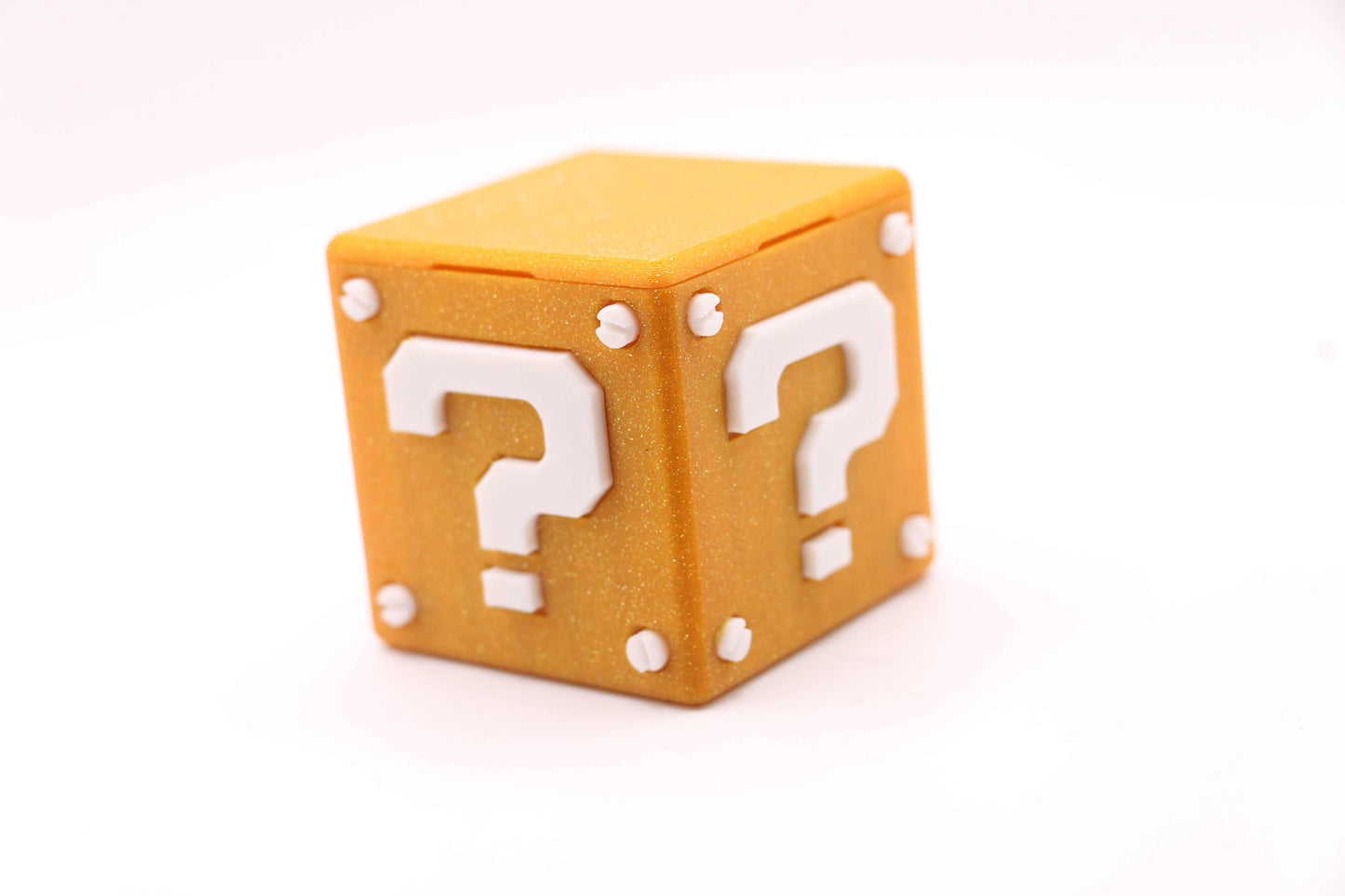 Super Mario Bros Nintendo Switch game case shaped like a Question Mark Block for cartridges and Micro SD cards
