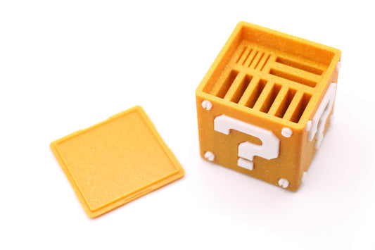 Super Mario Bros Nintendo Switch game case shaped like a question mark block for 8 cartridges and 5 micro SD cards