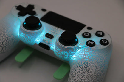 Loaded Pro LED PS4 Controller with custom TMR thumbsticks, instant hair triggers, back paddles, and glowing blue LED lights